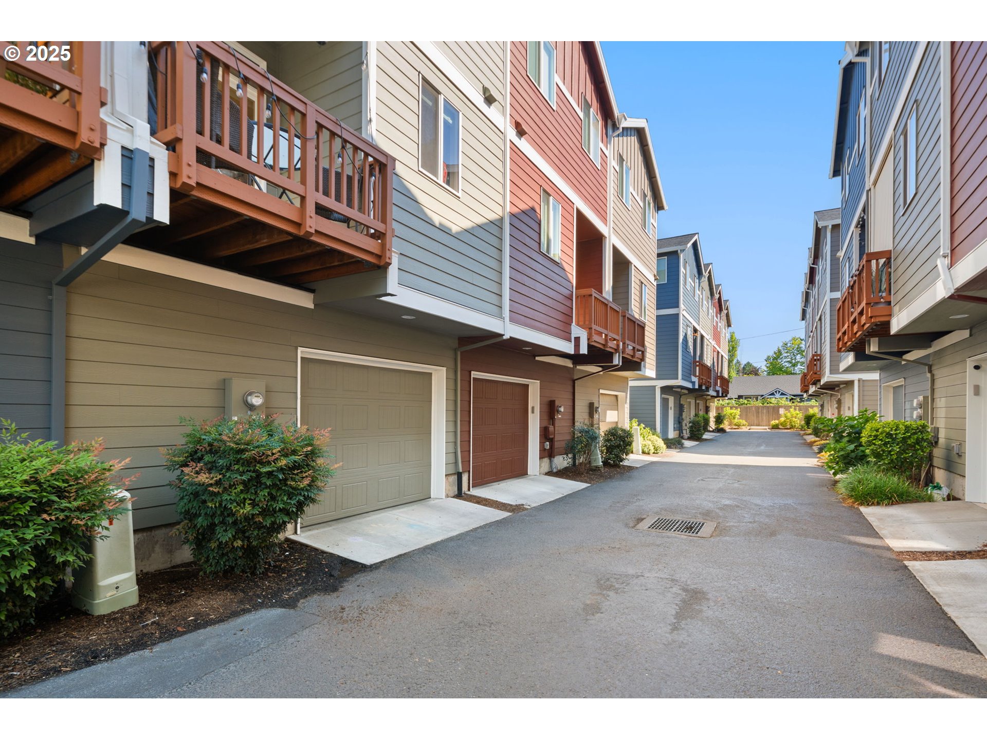 18292 Southwest Anna Mae Lane Beaverton, OR 97003 - Photo 31 of 34 a view of a street with tall buildings