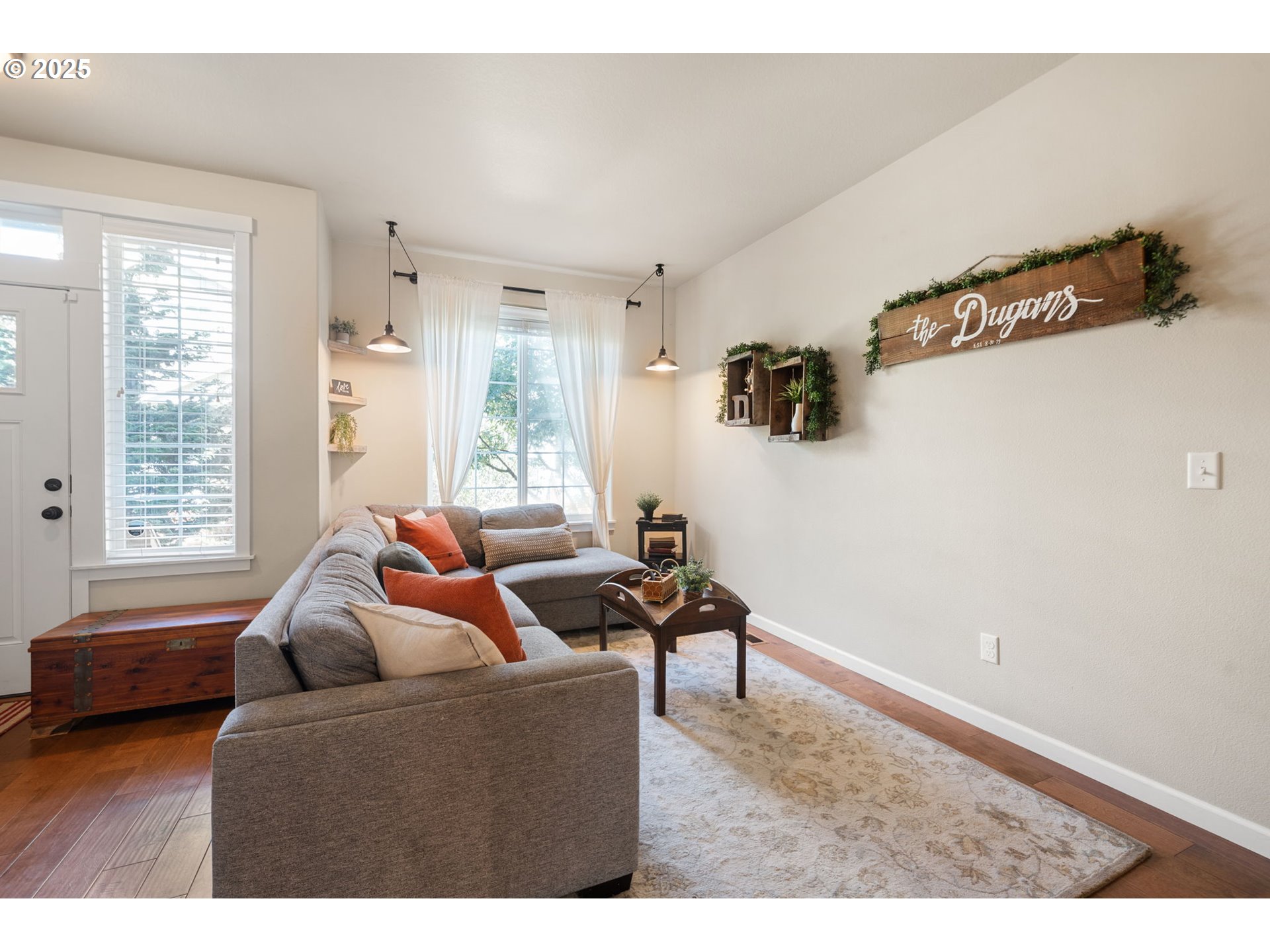 18292 Southwest Anna Mae Lane Beaverton, OR 97003 - Photo 6 of 34 a living room with furniture and a window