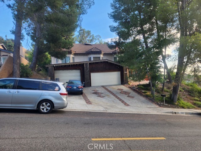 a car parked in front of a house