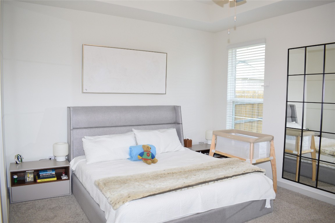 2409 Bear Cub Bend Leander, TX 78641 - Photo 11 of 37 a bedroom with a bed and a window