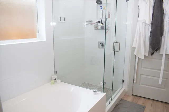 a bathroom with a sink vanity and a mirror