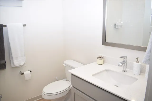 a bedroom with a bed and wall painting