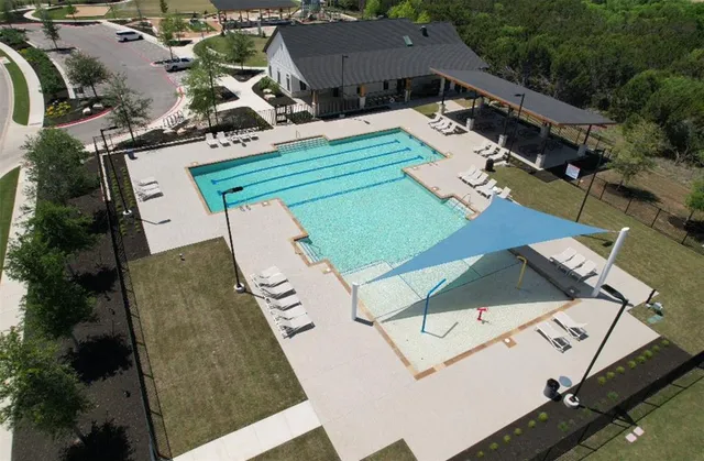 a outdoor space with lots of tables and chairs