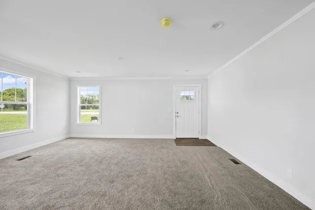 an empty room with windows