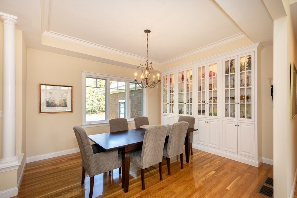 7 Tillinghast Drive, Unit 7 Hingham, MA 02043 - Photo 11 of 42 a view of a dining room with furniture window and wooden floor