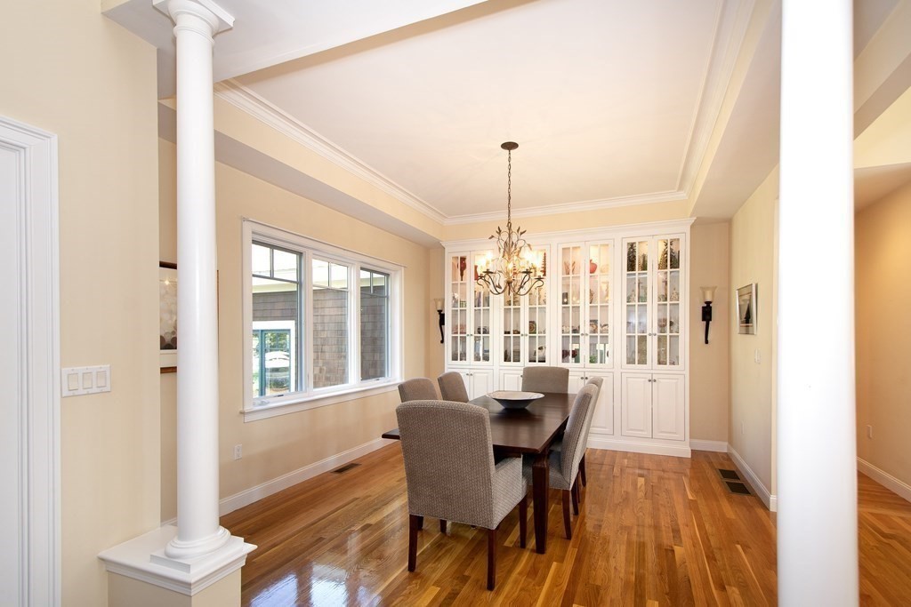 7 Tillinghast Drive, Unit 7 Hingham, MA 02043 - Photo 13 of 42 a view of a dining room with furniture window and outside view