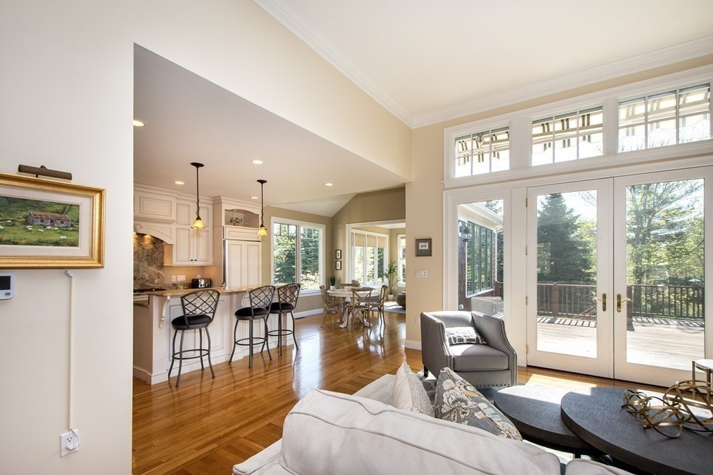 7 Tillinghast Drive, Unit 7 Hingham, MA 02043 - Photo 19 of 42 a living room with furniture and a large window