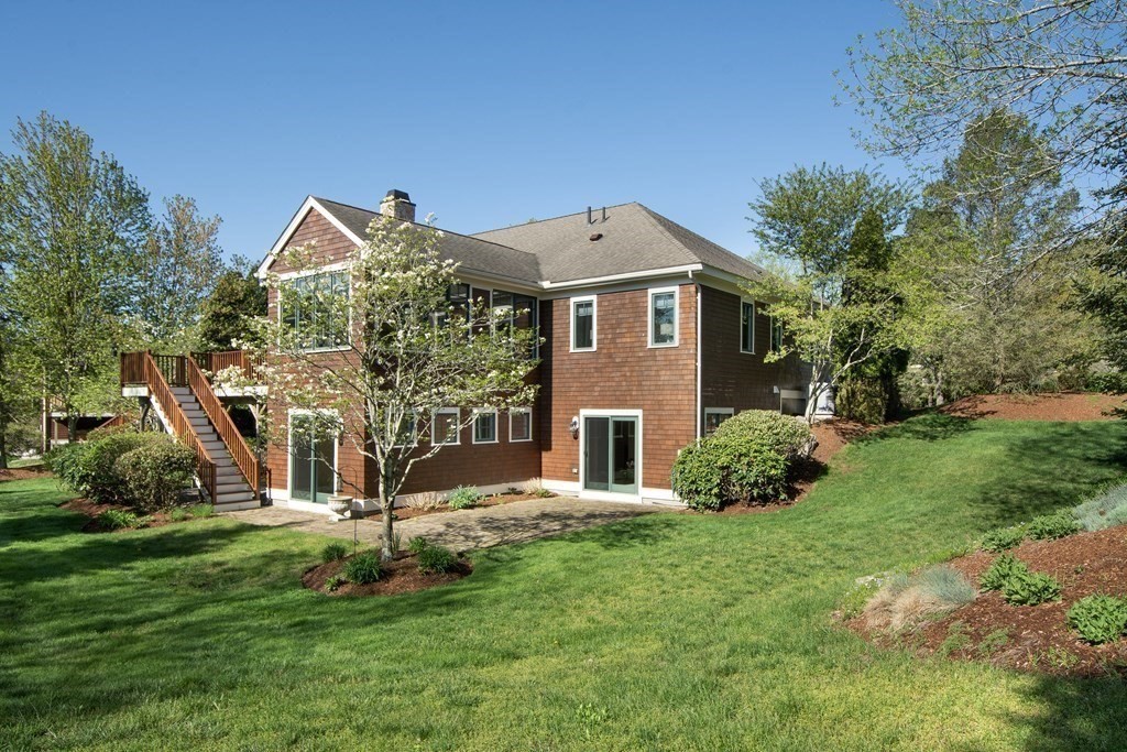 7 Tillinghast Drive, Unit 7 Hingham, MA 02043 - Photo 2 of 42 a front view of a house with a yard