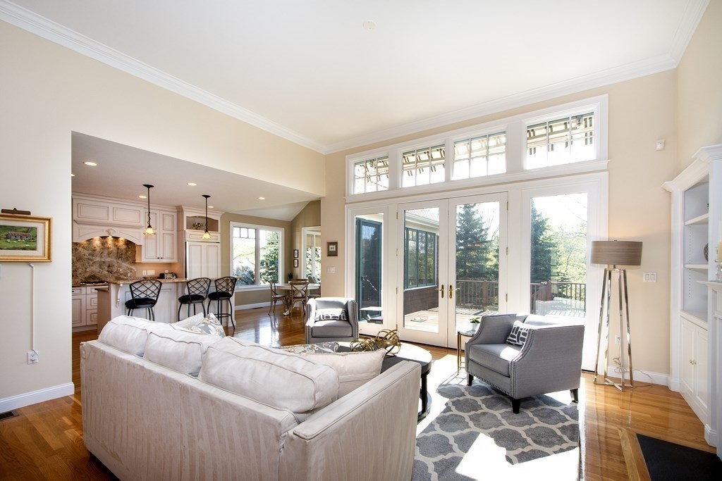 7 Tillinghast Drive, Unit 7 Hingham, MA 02043 - Photo 21 of 42 a living room with fireplace furniture and a large window