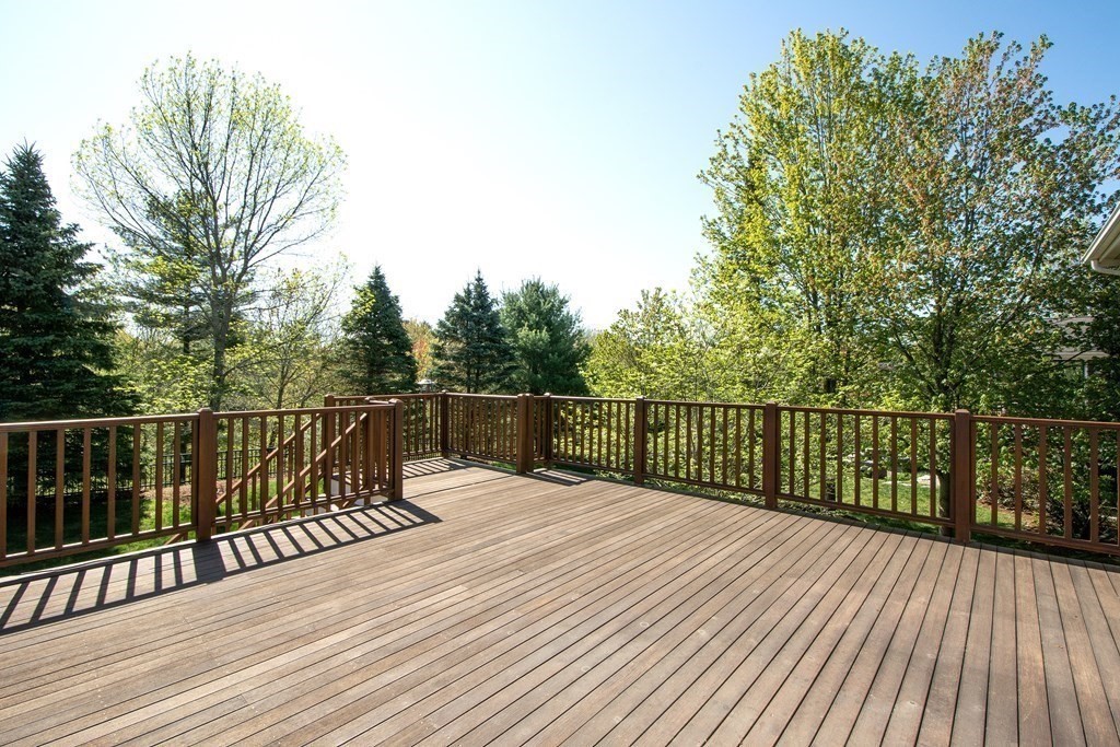 7 Tillinghast Drive, Unit 7 Hingham, MA 02043 - Photo 22 of 42 a balcony with view of balcony and wooden floor
