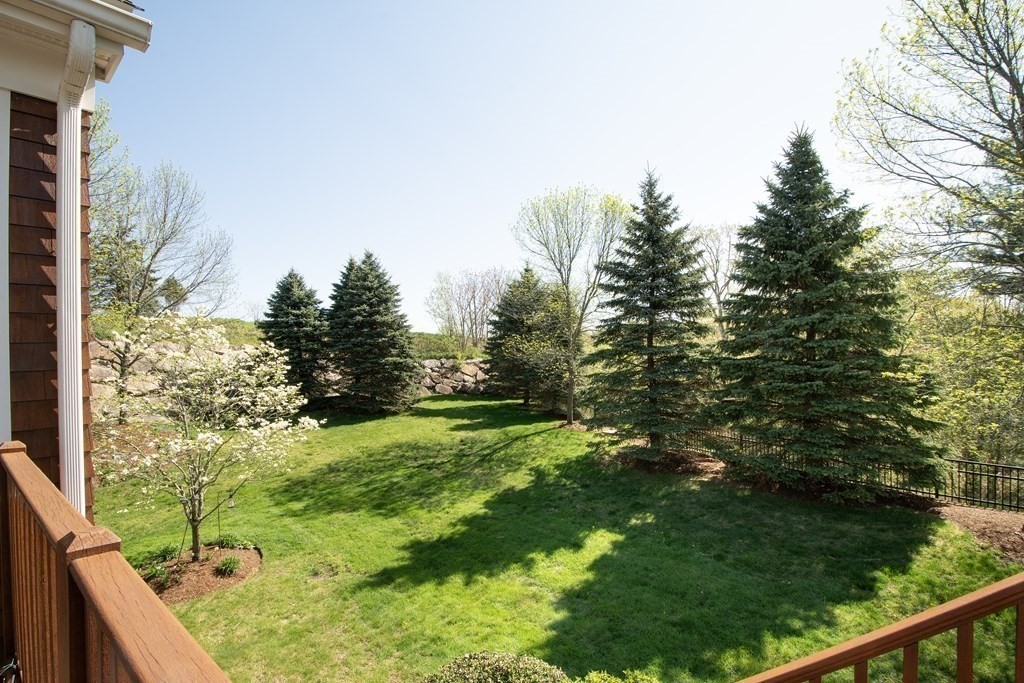 7 Tillinghast Drive, Unit 7 Hingham, MA 02043 - Photo 23 of 42 a view of a garden from a balcony