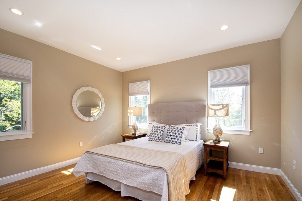 7 Tillinghast Drive, Unit 7 Hingham, MA 02043 - Photo 30 of 42 a bedroom with a bed and a window