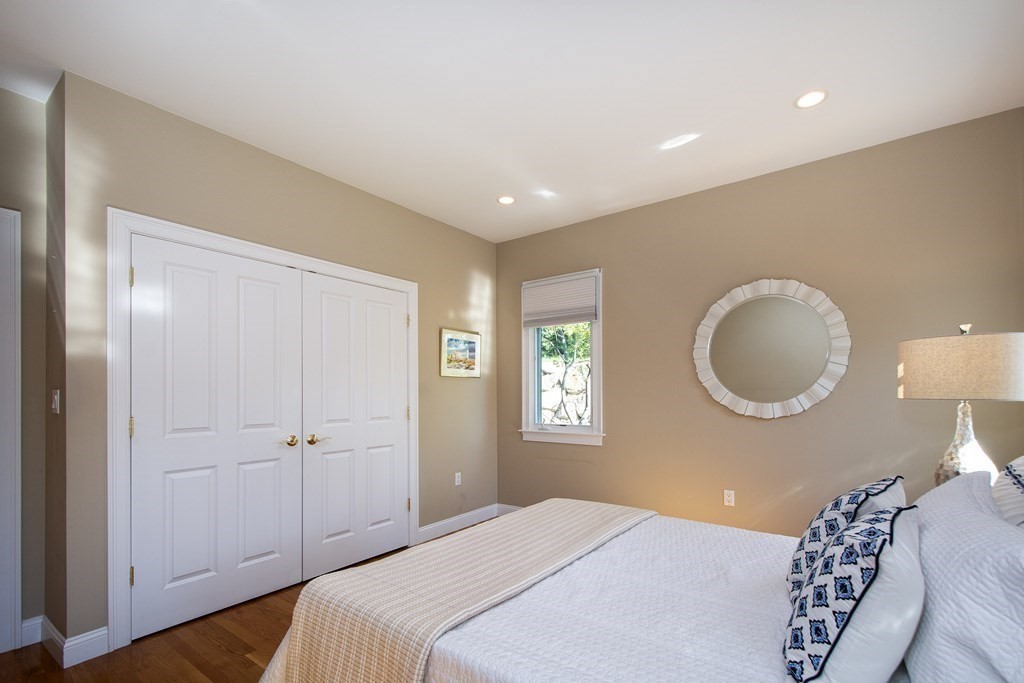 7 Tillinghast Drive, Unit 7 Hingham, MA 02043 - Photo 31 of 42 a bedroom with a bed and a window