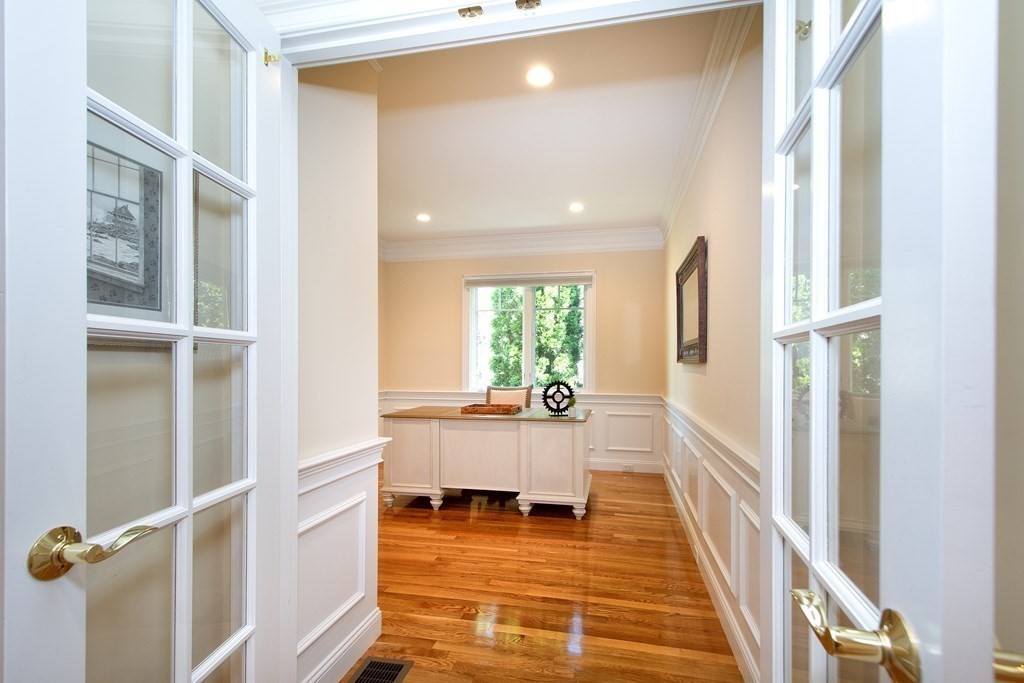 7 Tillinghast Drive, Unit 7 Hingham, MA 02043 - Photo 33 of 42 a living room with a table and a table