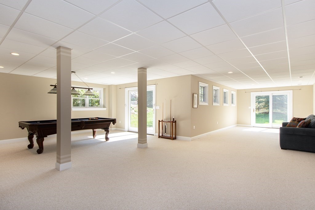 7 Tillinghast Drive, Unit 7 Hingham, MA 02043 - Photo 35 of 42 a view of a livingroom with furniture and a window