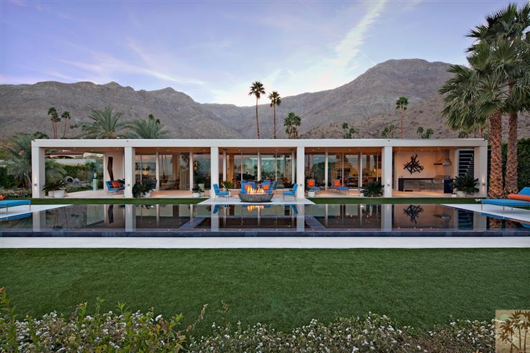 70205 Thunderbird Road Rancho Mirage, CA 92270 - Photo 1 of 25 aerial view of a house with a yard deck and furniture