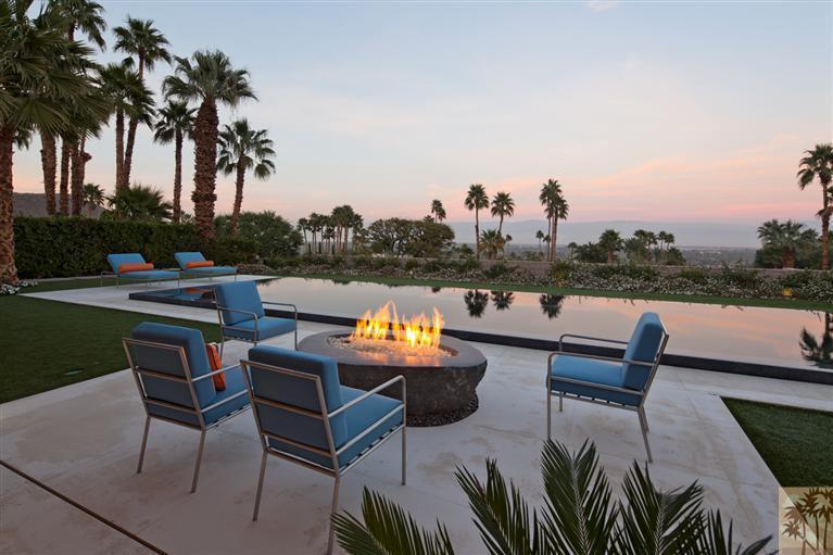 70205 Thunderbird Road Rancho Mirage, CA 92270 - Photo 23 of 25 a view of a terrace with furniture and a fire pit