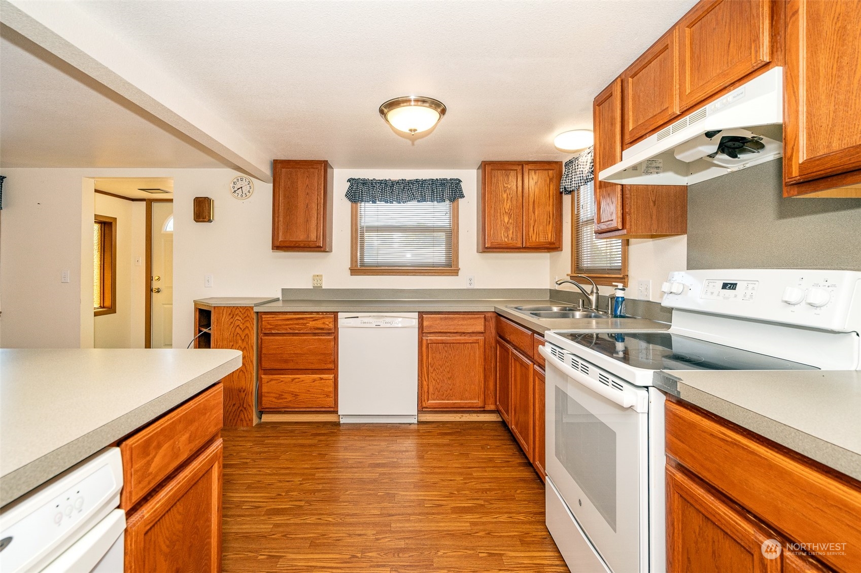 136 Dieckman Road Chehalis, WA 98532 - Photo 8 of 40 a kitchen with stainless steel appliances granite countertop a sink and a stove