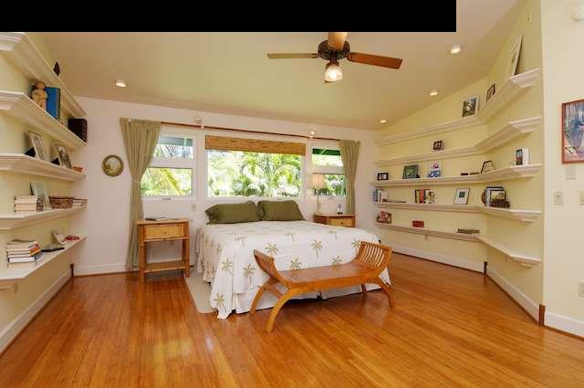 1011 Upper Ulumalu Road, Unit A Haiku, HI 96708 - Photo 20 of 30 a living room with furniture and a wooden floor