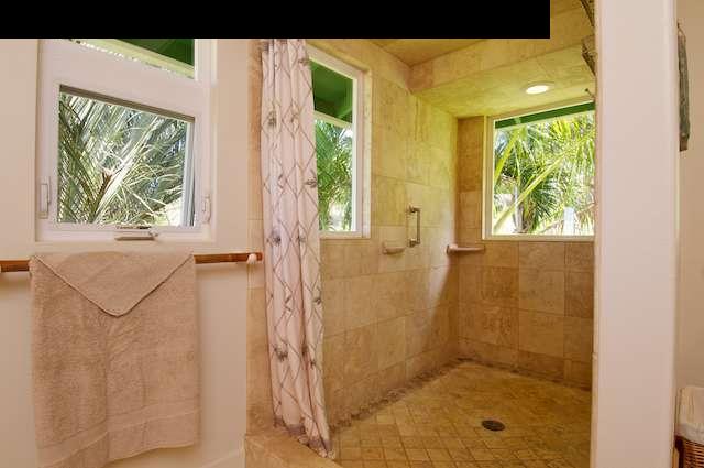 1011 Upper Ulumalu Road, Unit A Haiku, HI 96708 - Photo 22 of 30 a bathroom with a shower
