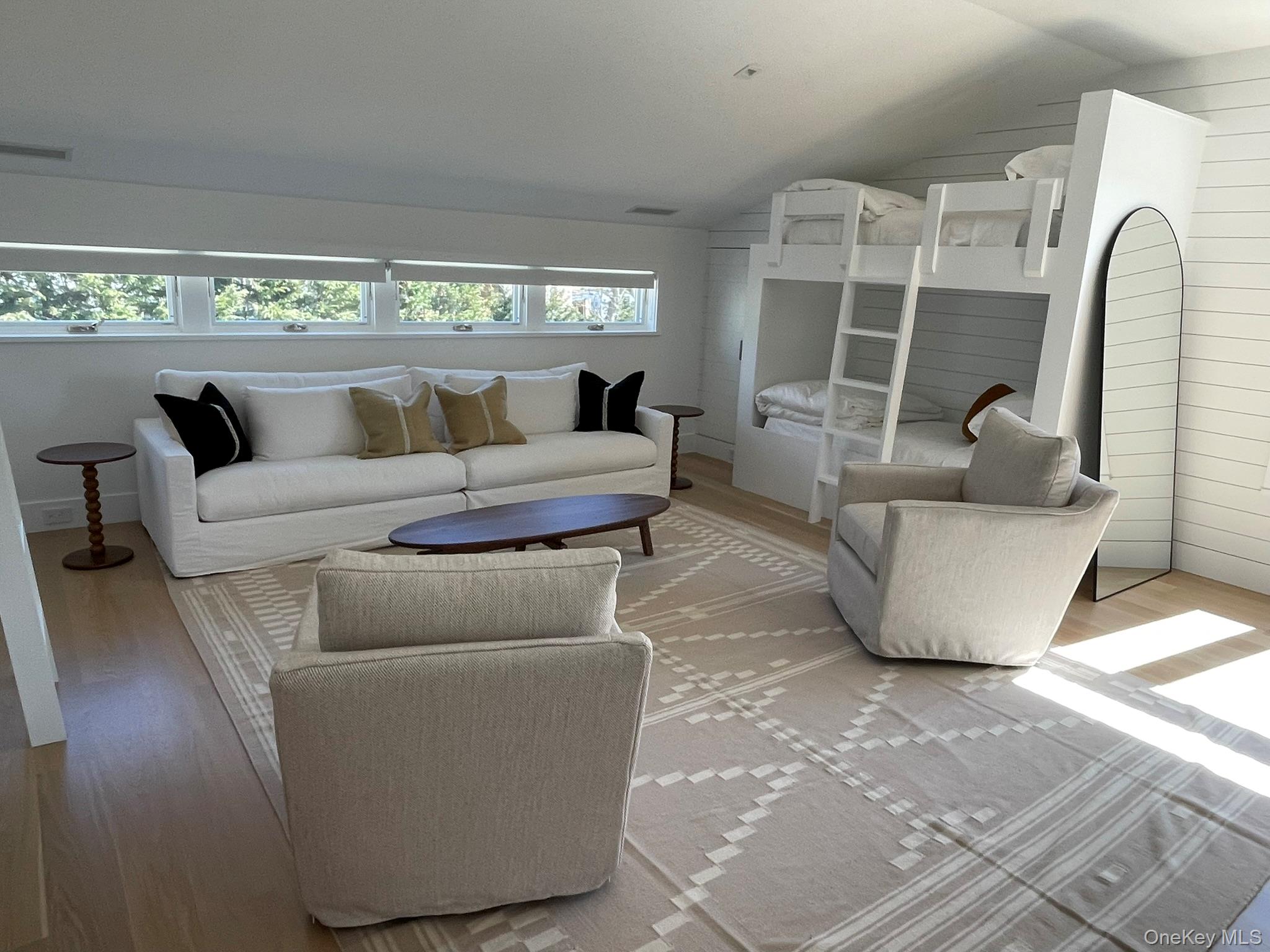 495 North Parish Drive Southold, NY 11971 - Photo 19 of 21 a living room with furniture and a large window