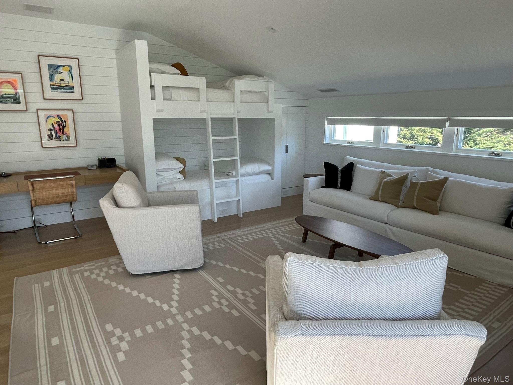 495 North Parish Drive Southold, NY 11971 - Photo 20 of 21 a living room with furniture and a large window