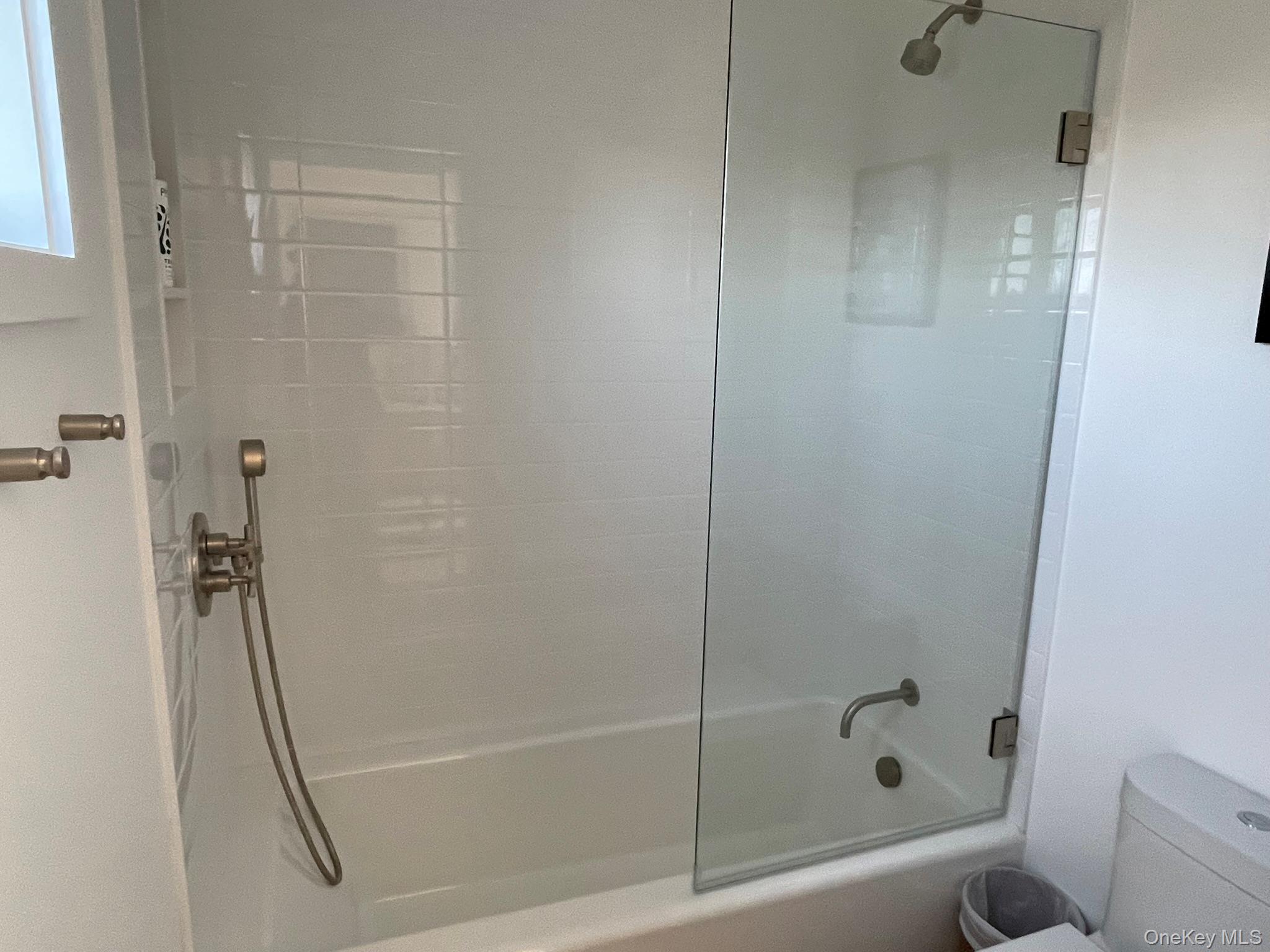 495 North Parish Drive Southold, NY 11971 - Photo 21 of 21 a bathroom with a bath tub