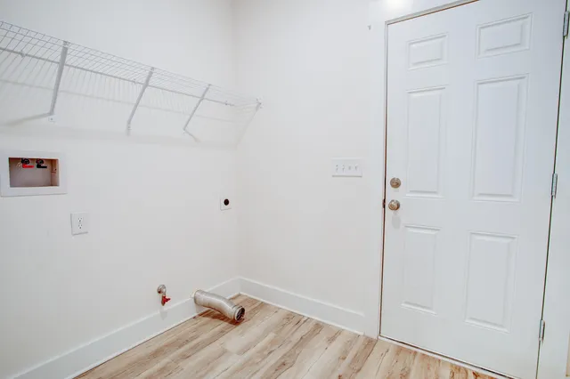 a view of a room with racks on the wall