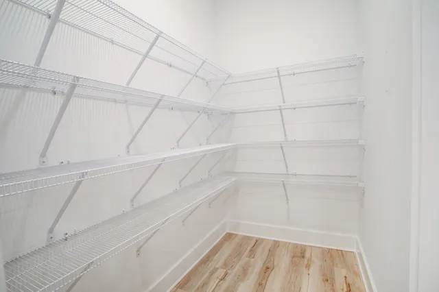 a view of a room with racks on the wall