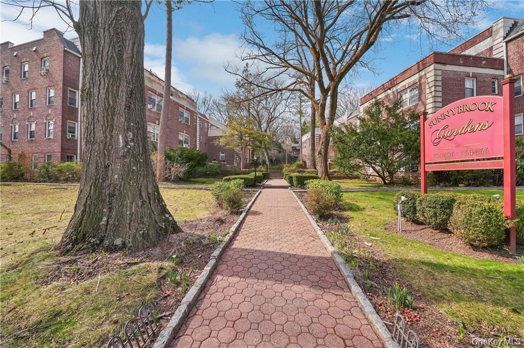 766 Palmer Road, Unit 2F Bronxville, NY 10708 - Photo 22 of 22 View of community featuring a lawn