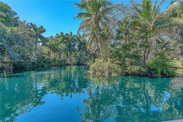 a view of a lake view with a garden