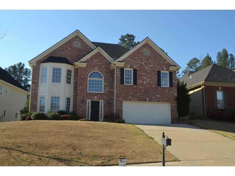 734 Laurel W Court Dacula, GA 30019 - Photo 1 of 1 Exterior Front. Beautiful traditional brick front home with lots of light and double bay windows in front of house.