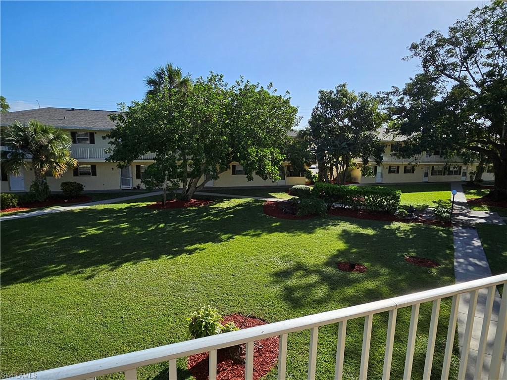 3325 Airport-Pulling Road, Unit D7 Naples, FL 34105 - Photo 11 of 17 View of yard