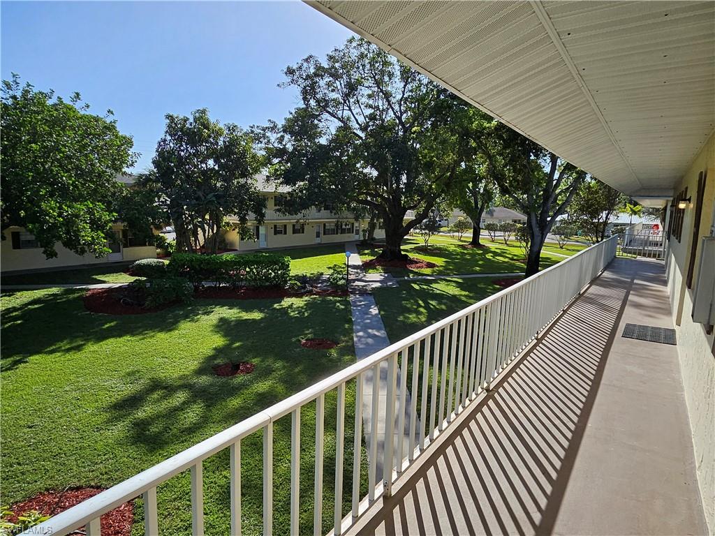 3325 Airport-Pulling Road, Unit D7 Naples, FL 34105 - Photo 14 of 17 View of balcony
