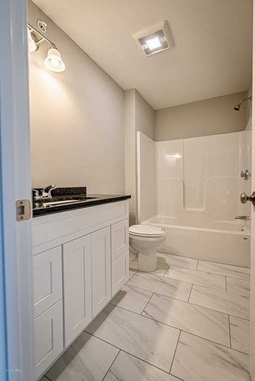 49 Riverside Drive, Unit 49A Lakeville, MA 02347 - Photo 24 of 31 a bathroom with a bathtub and a shower