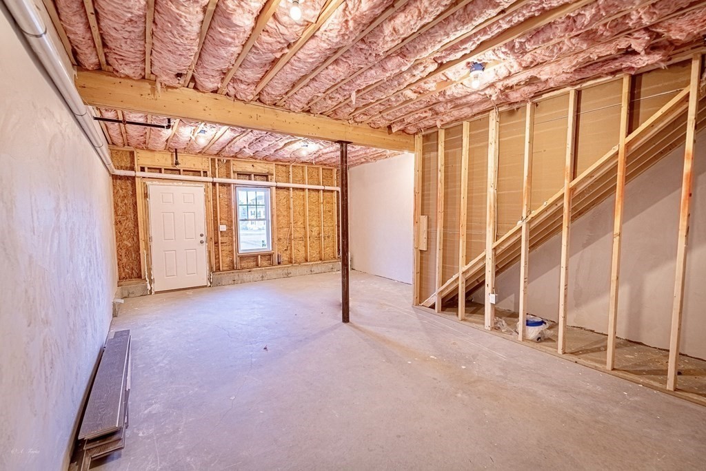 49 Riverside Drive, Unit 49A Lakeville, MA 02347 - Photo 27 of 31 a view of an empty room with windows