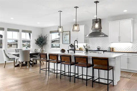 a kitchen with kitchen island granite countertop lots of counter top space and appliances