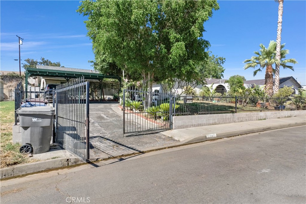3261 Viola Drive Riverside, CA 92501 - Photo 2 of 21 a street view with a building and trees in the background