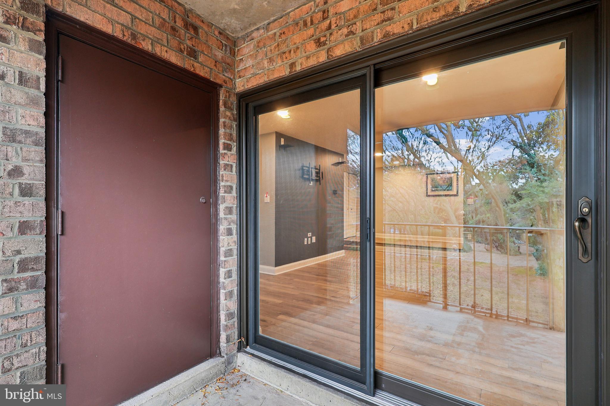 10 Silverwood Circle, Unit 10 Annapolis, MD 21403 - Photo 22 of 58 a view of a glass door of the house
