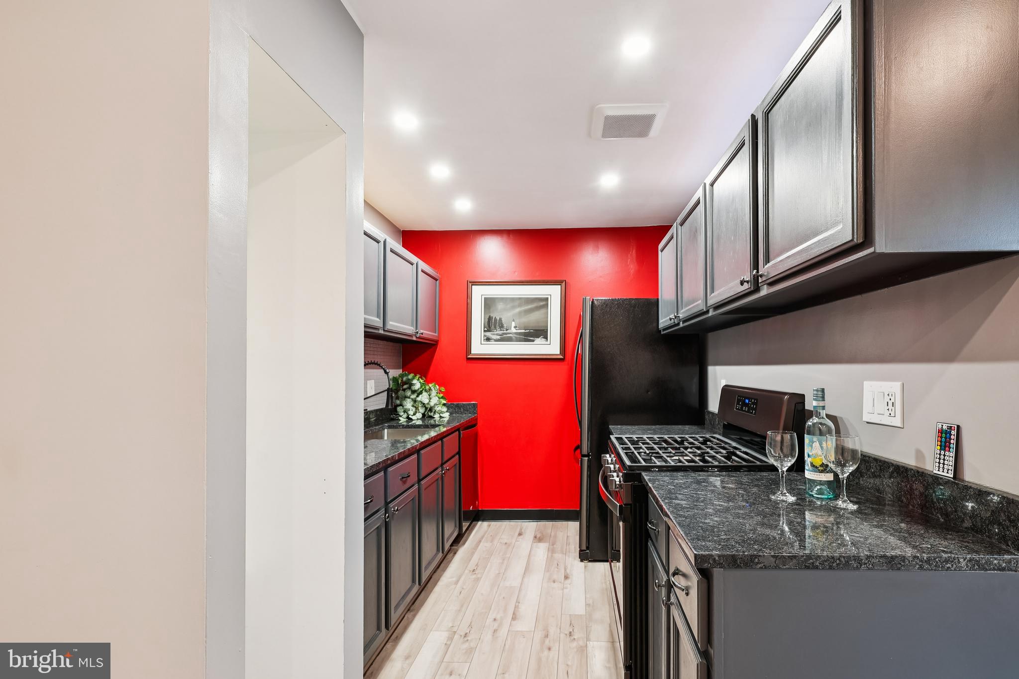 10 Silverwood Circle, Unit 10 Annapolis, MD 21403 - Photo 35 of 58 a kitchen with stainless steel appliances granite countertop a sink stove and cabinets