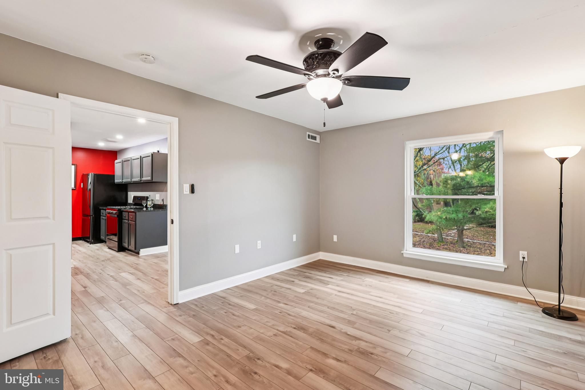 10 Silverwood Circle, Unit 10 Annapolis, MD 21403 - Photo 37 of 58 a view of a livingroom with a hardwood floor and a ceiling fan