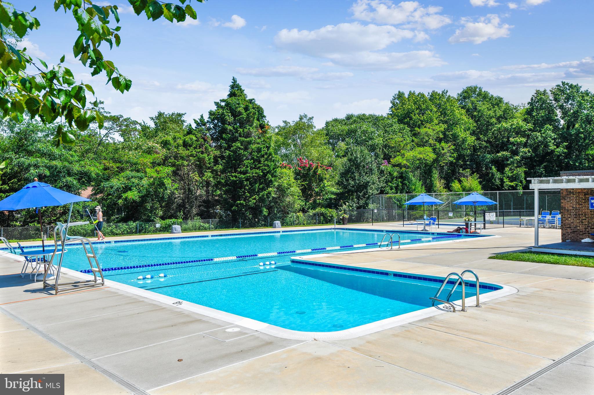 10 Silverwood Circle, Unit 10 Annapolis, MD 21403 - Photo 49 of 58 a view of a swimming pool with an outdoor space and seating area