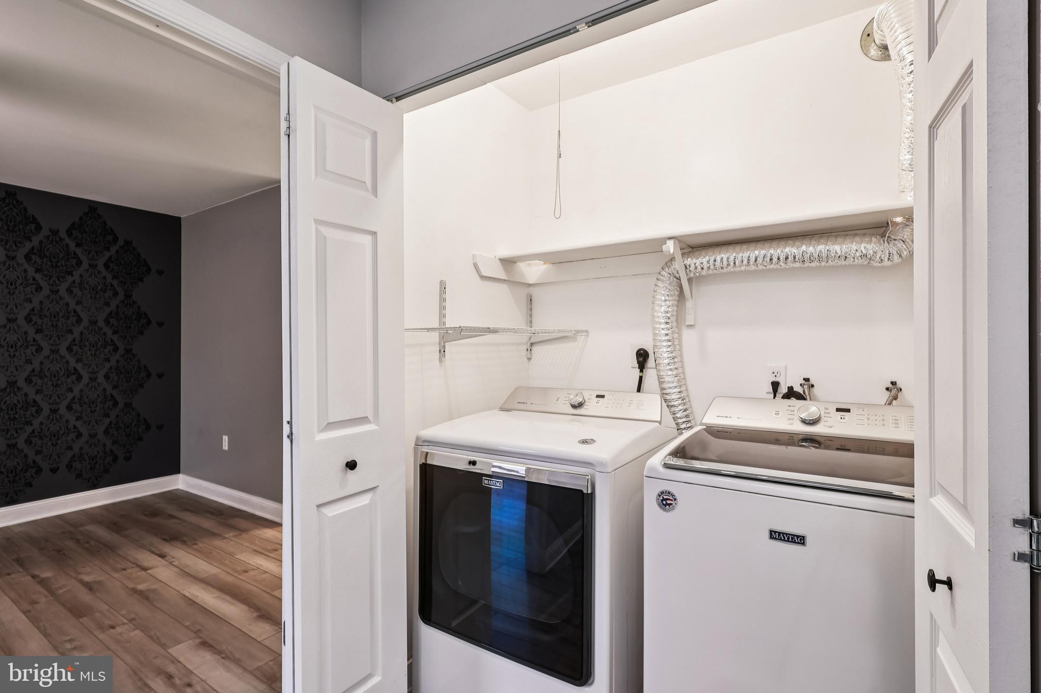 10 Silverwood Circle, Unit 10 Annapolis, MD 21403 - Photo 9 of 58 a utility room with dryer and washer