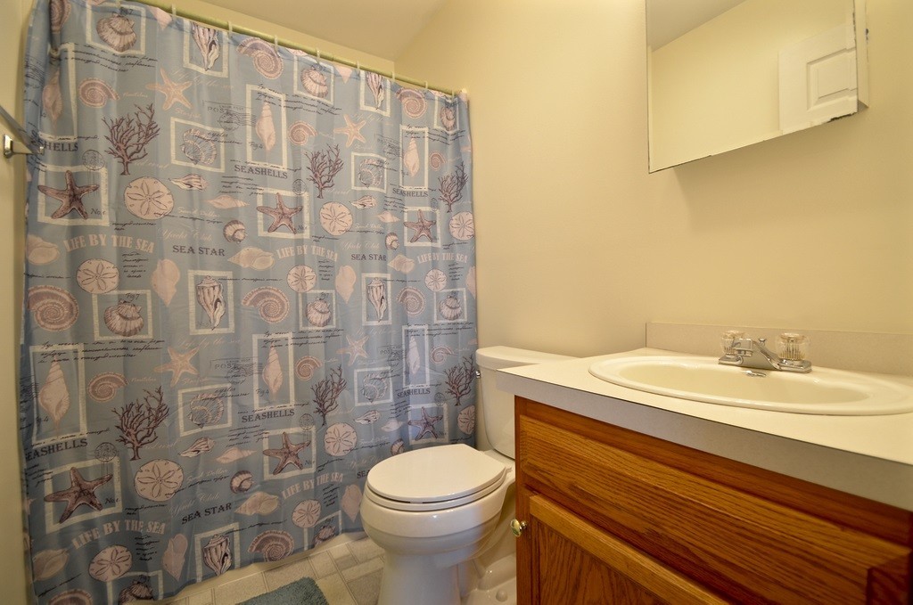 151 Fitch Road Clinton, MA 01510 - Photo 14 of 25 a bathroom with a sink a toilet and shower