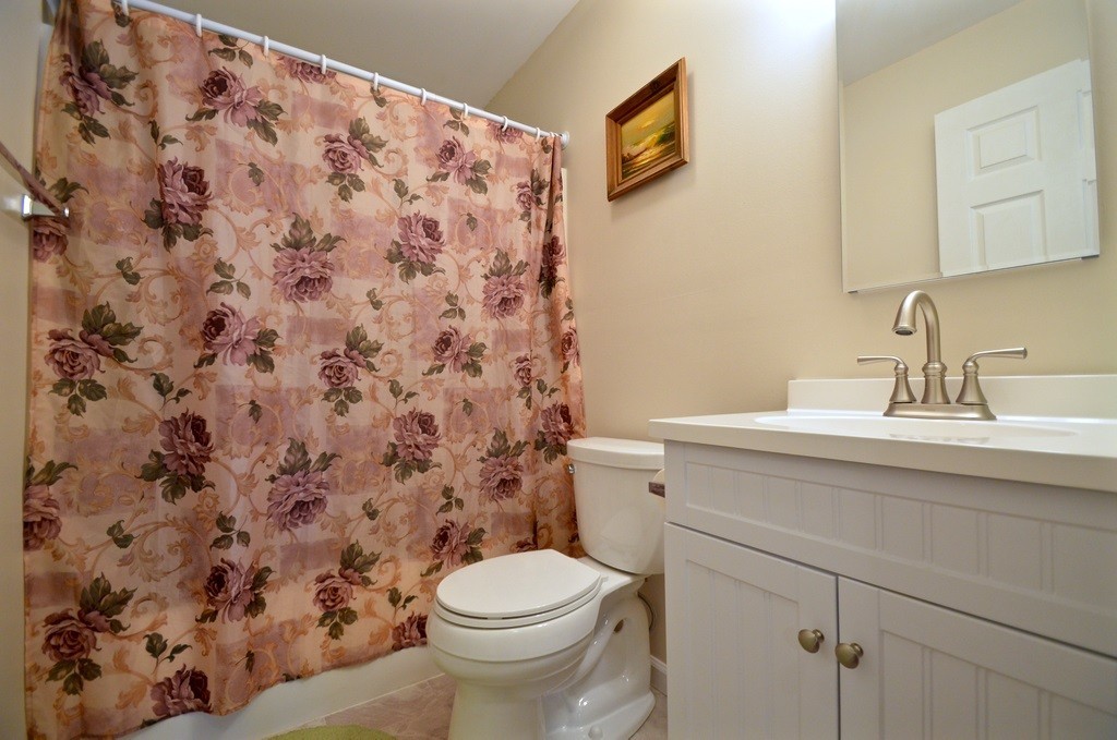 151 Fitch Road Clinton, MA 01510 - Photo 17 of 25 a bathroom with a sink and a toilet