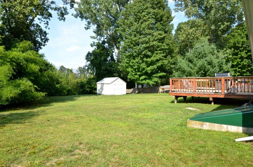 151 Fitch Road Clinton, MA 01510 - Photo 24 of 25 a view of a wooden deck and a yard