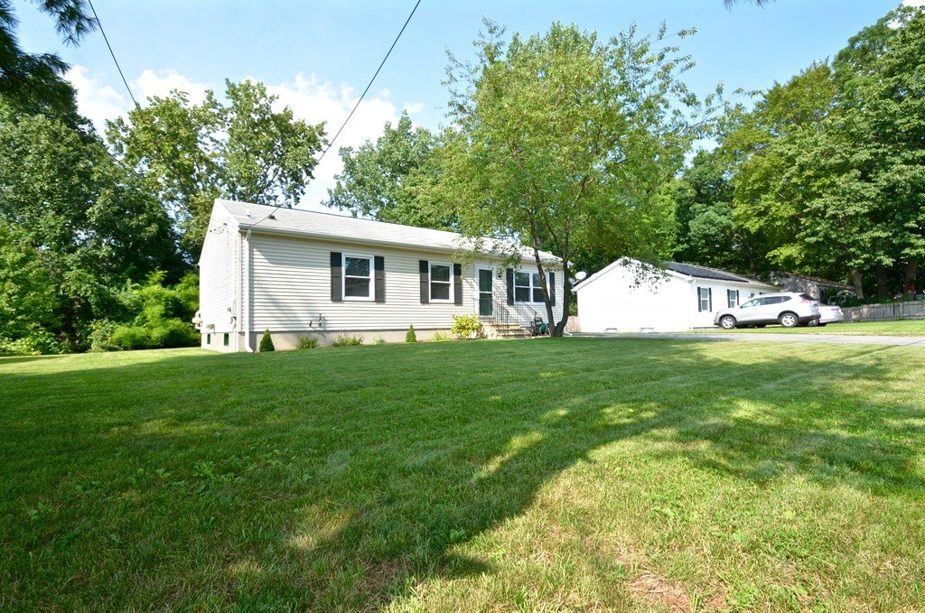 151 Fitch Road Clinton, MA 01510 - Photo 25 of 25 a view of a house with a backyard