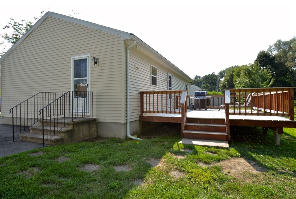 151 Fitch Road Clinton, MA 01510 - Photo 4 of 25 a view of a house with backyard and sitting area