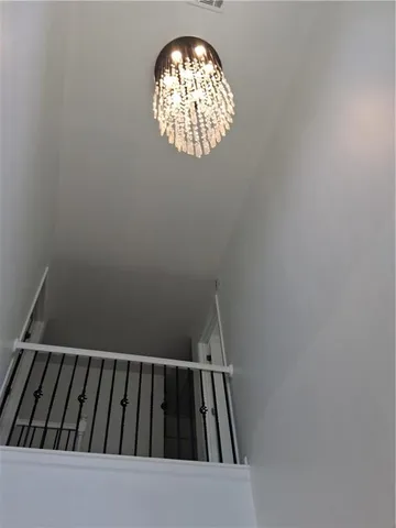 a view of a kitchen with a sink