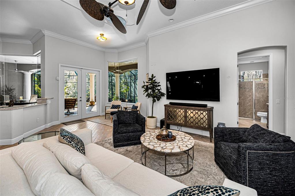 10709 Watula Court New Port Richey, FL 34655 - Photo 35 of 99 a living room with furniture and a flat screen tv